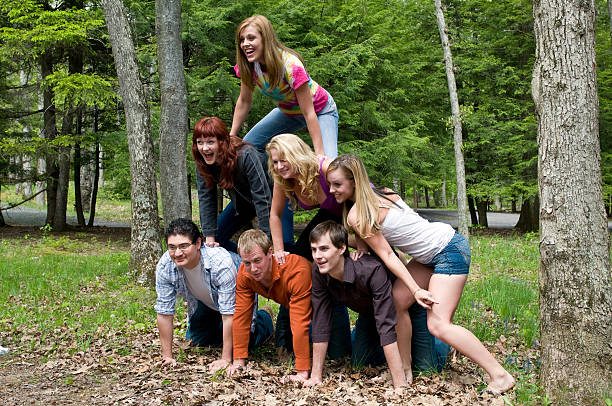 Our program seven college age friends forming a human pyramid. deep creek lakealypse